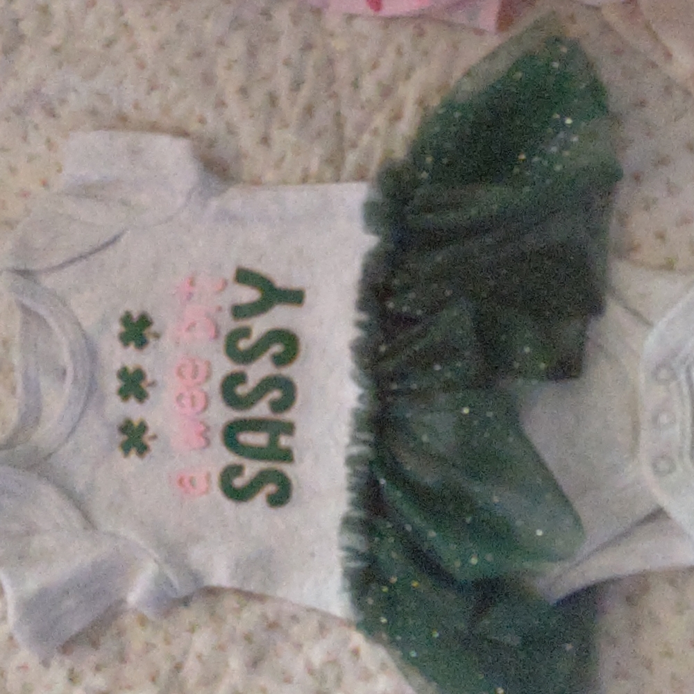 A wee bit sassy onesie with tutu attached